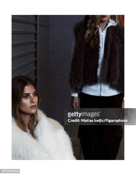 Models Estee Rammant and Nathalia O pose at a fashion shoot for Madame Figaro on September 19, 2017 in Paris, France. Left: Coat . Right: Vest ,...