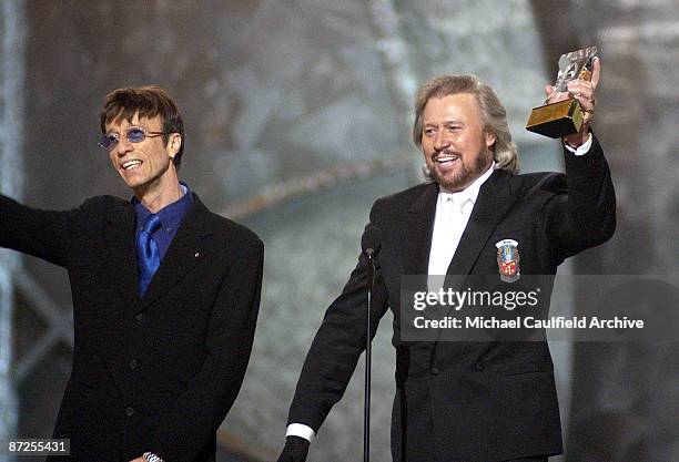 Robin Gibb and Barry Gibb accept the Legends Award at the 45th Annual GRAMMY Awards.