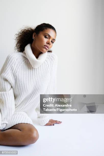 Model Tina Kunakey are photographed for Madame Figaro on September 11, 2017 in Paris, France. Sweater dress , earrings personal. PUBLISHED IMAGE....