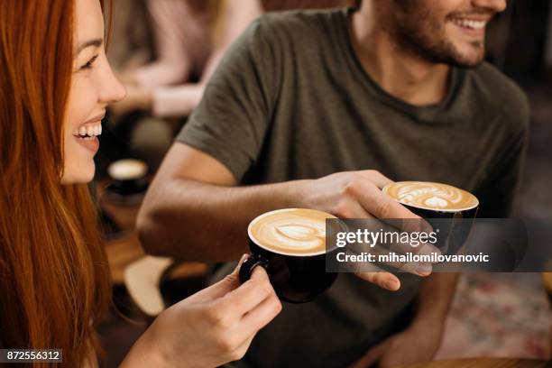 enjoying coffee - friends in cafe stock pictures, royalty-free photos & images