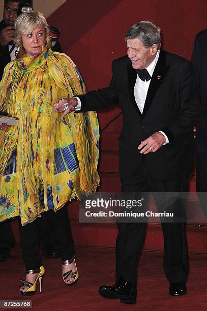 Yanou Collart and actor Jerry Lewis leaves the 'Bright Star' premiere at the Grand Theatre Lumiere during the 62nd Annual Cannes Film Festival on May...