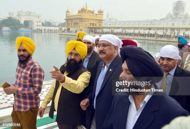 Director general Pakistan Rangers Sindh Major General Mohammad Saeed with delegation member paying obeisance at Golden Temple, on November 10, 2017...