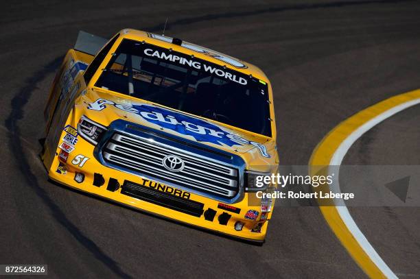 Todd Gilliland, driver of the Pedigree Toyota, drives during practice for the NASCAR Camping World Truck Series Lucas Oil 150 at Phoenix...