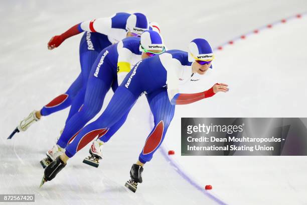 Olga Graf, Natalia Voronina and Yekaterina Shikhova of Russia compete in the women team pursuit on day one during the ISU World Cup Speed Skating...