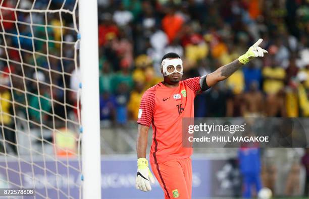 South Africa's goalkeeper and captain Itumeleng Khune gestures during the FIFA 2018 World Cup Africa Group D qualifying football match between South...