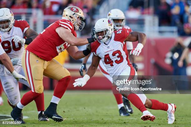 San Francisco 49ers offensive tackle Erik Magnuson battles with Arizona Cardinals inside linebacker Haason Reddick during an NFL game between the...