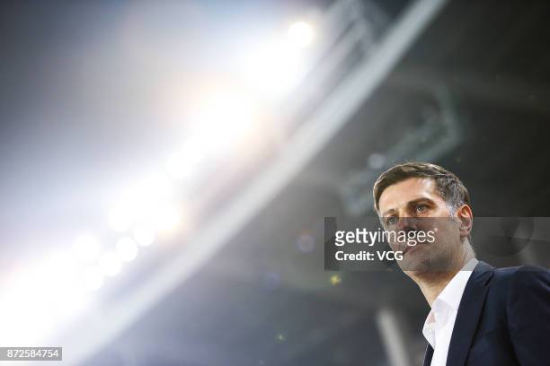 Mladen Krstajic, head coach of Serbia, looks on during International Friendly Football Match between China and Serbia at Tianhe Stadium on November...