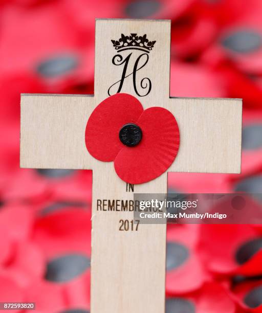 Prince Harry's Remembrance Tribute Cross, bearing his Royal Cypher, which he planted during a visit to the Field of Remembrance at Westminster Abbey...