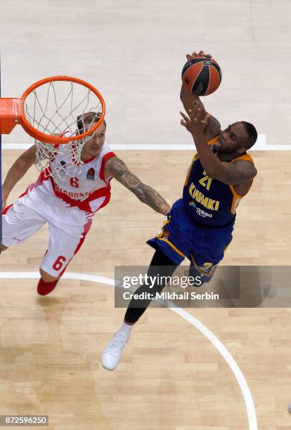 James Anderson, #21 of Khimki Moscow Region competes with Janis Timma, #6 of Baskonia Vitoria Gasteiz in action during the 2017/2018 Turkish Airlines...