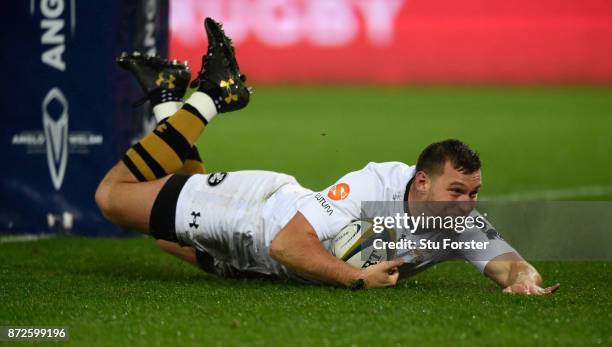 Wasps centre Brendan Macken dives over for the second Wasps try during the Anglo-Welsh Cup match between Ospreys and Wasps at Liberty Stadium on...