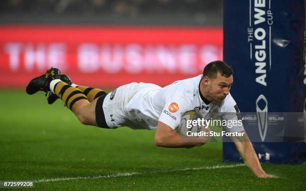 Wasps centre Brendan Macken dives over for the second Wasps try during the Anglo-Welsh Cup match between Ospreys and Wasps at Liberty Stadium on...