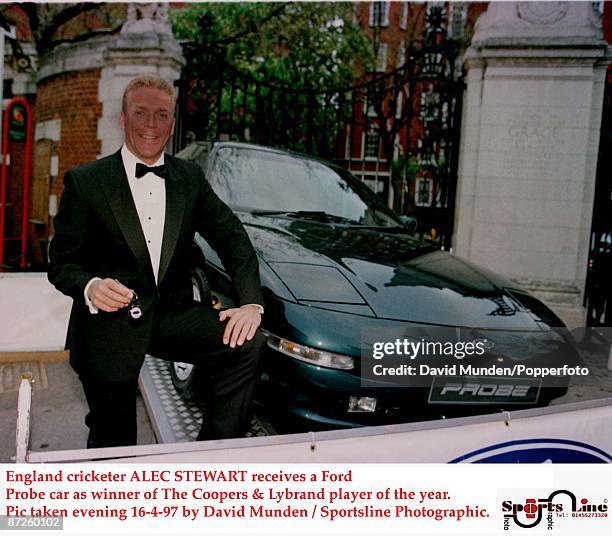 England cricketer ALEC STEWART receives a Ford Probe car as winner of The Coopers & Lybrand player of the year
