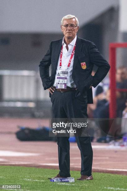 Marcello Lippi, head coach of China, looks on during International Friendly Football Match between China and Serbia at Tianhe Stadium on November 10,...