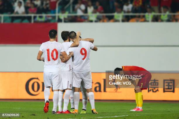 Aleksandar Mitrovic of Serbia celebrates with team mates after scoring his team's second goal during International Friendly Football Match between...