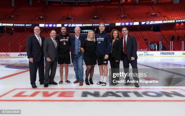 Bill Daly, NHL Deputy Commissioner, Gary Bettman - NHL Commisisoner, Erik Karlsson of the Ottawa Senators, Thomas Johansson - Chairman Live Nation...