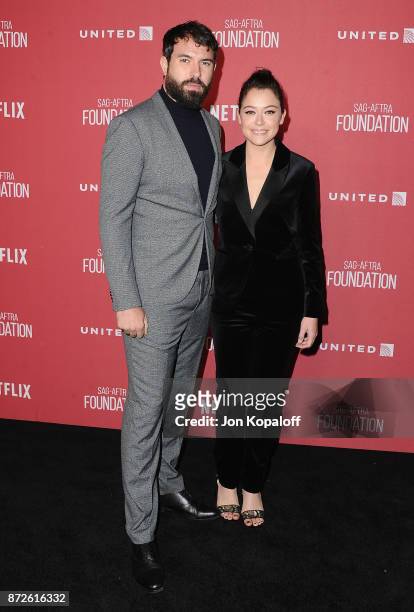 Actress Tatiana Maslany and Tom Cullen arrive at SAG-AFTRA Foundation Patron of the Artists Awards 2017 on November 9, 2017 in Beverly Hills,...