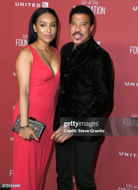 Lisa Parigi, Lionel Richie arrives at the SAG-AFTRA Foundation Patron of the Artists Awards 2017 on November 9, 2017 in Beverly Hills, California.