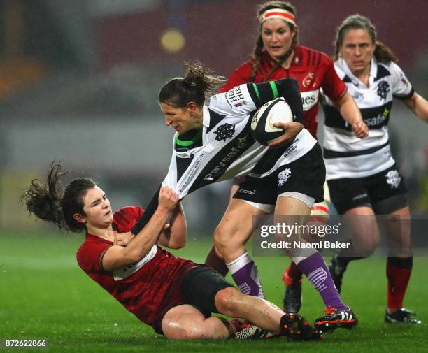 Christelle Le Duff is tackled during the Inaugural Representative Match between Barbarians Women's RFC and Munster Women, on November 10, 2017 in...