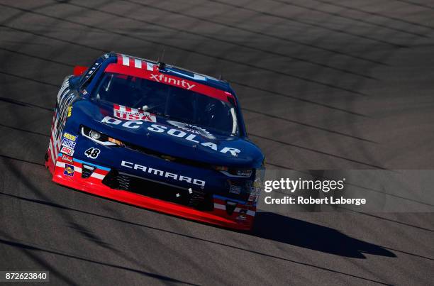 Brennan Poole, driver of the DC Solar Chevrolet, drives during practice for the NASCAR XFINITY series Ticket Galaxy 200 at Phoenix International...