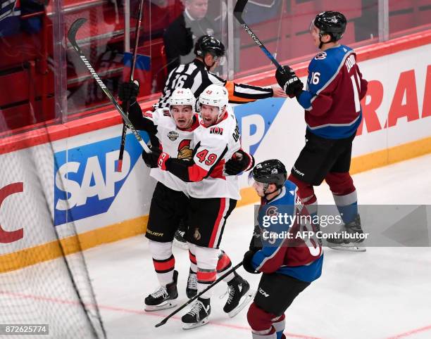 Ottawa Senators Christopher DiDomenico celebrates with Jean-Gabriel Pageau his goal in the second period of the NHL Global Series hockey game between...