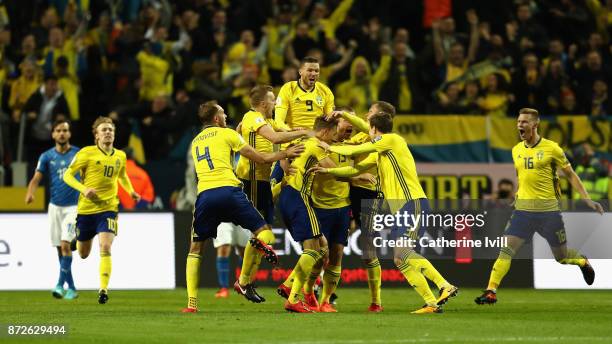 Jakob Johansson of Sweden celebrates scoring his sides first goal with his team mates during the FIFA 2018 World Cup Qualifier Play-Off: First Leg...