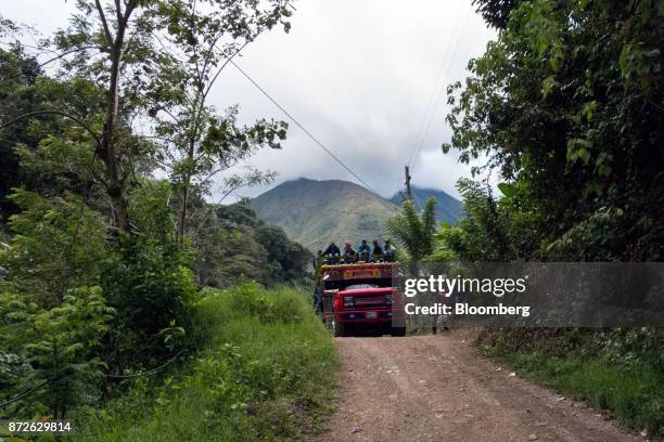 Passengers ride a chiva public bus in Ituango, Antioquia Department, Colombia, on Monday, Oct. 30, 2017. With post-conflict chaos of the 50-year...