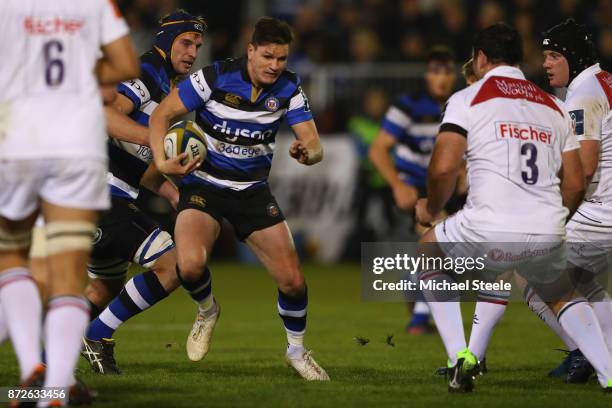 Freddie Burns of Bath runs at the Leicester defence during the Anglo-Welsh Cup Round 2 match between Bath Rugby and Leicester Tigers at the...