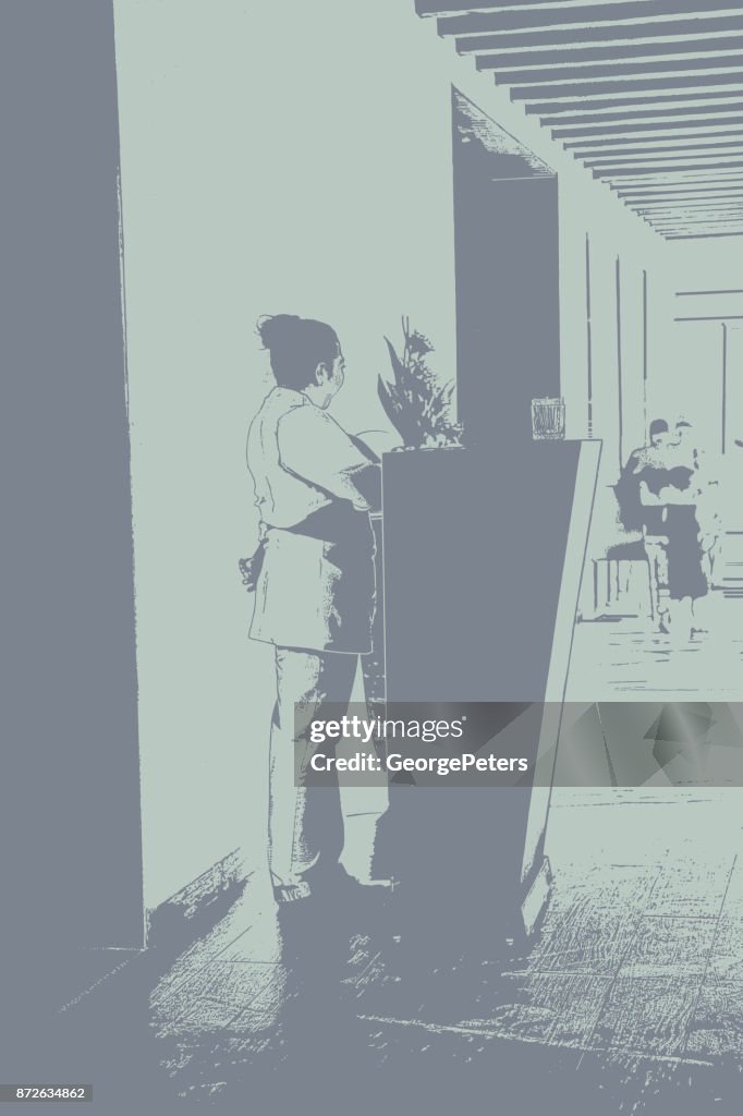 Hispanic maitre d at Mexican restaurant