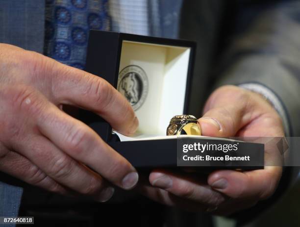 Mark Recchi holds his Hockey Hall of Fame ring during a media opportunity at the Hockey Hall Of Fame and Museum on November 10, 2017 in Toronto,...