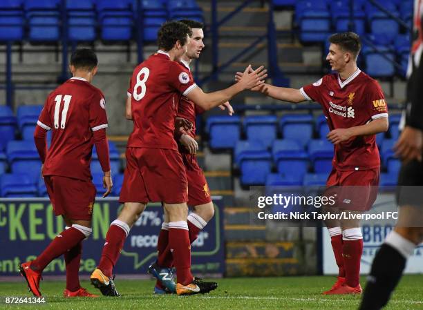 Matty Virtue of Liverpool celebrates his goal with team mate Cameron Brannagan during the Premier League International Cup match between Liverpool...