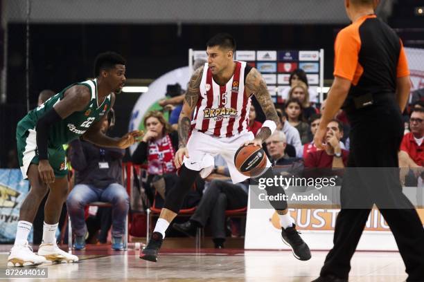 Keni Gabriel of Panathinaikos Superfoods in action against Giorgos Printezis of Olympiacos Piraeus during the Turkish Airlines Euroleague basketball...