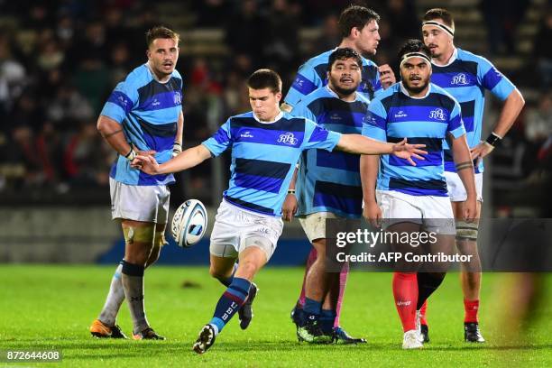 Barbarian's fullback Matthieu Jalibert kicks the ball during the rugby union match between French Barbarians and New Zealand's Maoris All Blacks on...