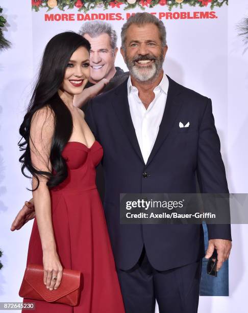 Actor Mel Gibson and Rosalind Ross arrive at the premiere of Paramount Pictures' 'Daddy's Home 2' at Regency Village Theatre on November 5, 2017 in...