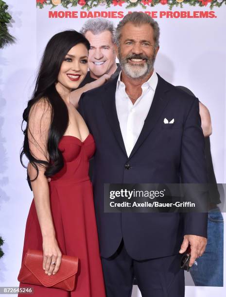 Actor Mel Gibson and Rosalind Ross arrive at the premiere of Paramount Pictures' 'Daddy's Home 2' at Regency Village Theatre on November 5, 2017 in...