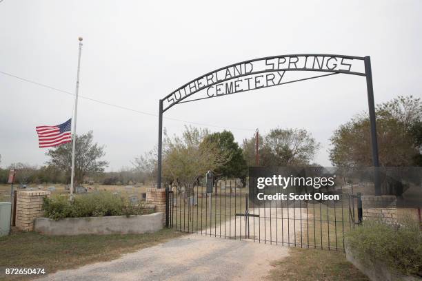 Flag flies at half mast outside the Sutherland Springs Cemetery on November 10, 2017 in Sutherland Springs, Texas. Tomorrow the first victimis of the...