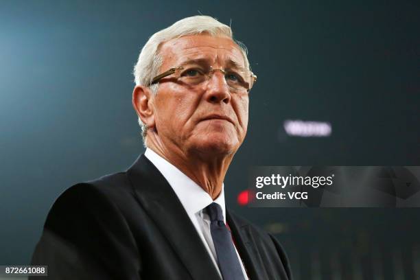 Marcello Lippi, head coach of China, looks on during International Friendly Football Match between China and Serbia at Tianhe Stadium on November 10,...