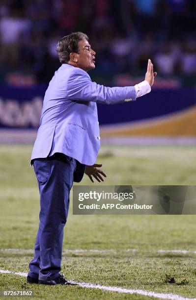 Honduras' coach, Colombian Jorge Luis Pinto, gives instructions during the first leg football match of their 2018 World Cup qualifying play-off...