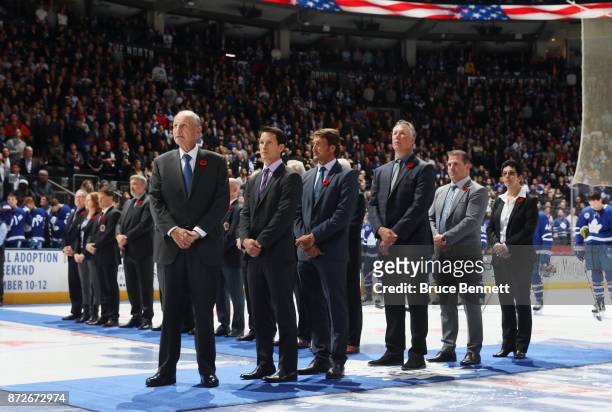 Jeremy Jacobs, Paul Kariya, Teemu Selanne, Dave Andreychuk, Mark Recchi and Danielle Goyotte take part in the pregame ceremony prior to the game...