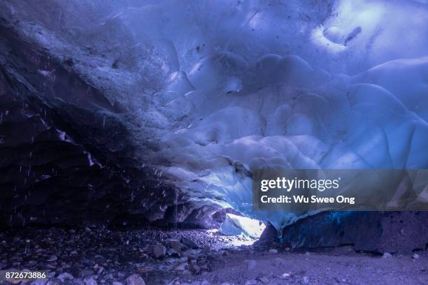 inside the mendenhall ice cave in alaska - wu swee ong stock pictures, royalty-free photos & images