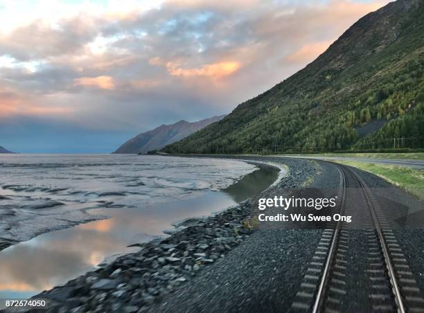 alaska coastal railway track in kenai peninsula - wu swee ong stock pictures, royalty-free photos & images