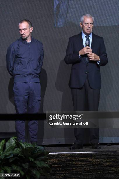 Photographer Tim Walker and Chief Executive Officer of Pirelli & C. S.p.A., Marco Tronchetti Provera seen on stage during the Pirelli Calendar 2018...