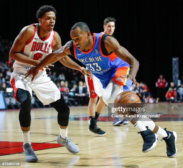 Chris Wright of the Oklahoma City Blue drives to the basket against Jarell Eddie of the Windy City Bulls during the first quarter of an NBA G-League...