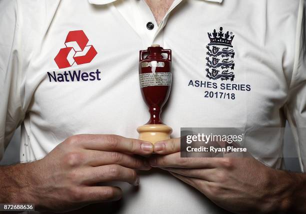 Player poses with a replica of the Ashes Urn during the 2017/18 England Ashes Squad portrait session at the Adelaide Oval on November 11, 2017 in...