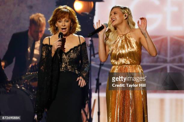 Reba McEntire and Kelsea Ballerini perform during the 51st annual CMA Awards at the Bridgestone Arena on November 8, 2017 in Nashville, Tennessee.