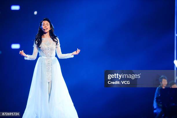 Singer Karen Mok performs on the stage during 2017 Alibaba Singles' Day Global Shopping Festival gala at Mercedes-Benz Arena on November 10, 2017 in...