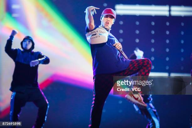 Singer Jackson Wang performs on the stage during 2017 Alibaba Singles' Day Global Shopping Festival gala at Mercedes-Benz Arena on November 10, 2017...