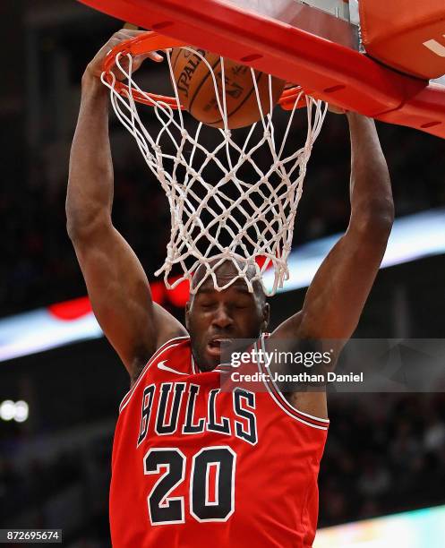 Quincy Pondexter of the Chicago Bulls dunks against the Indiana Pacers at the United Center on November 10, 2017 in Chicago, Illinois. The Pacers...