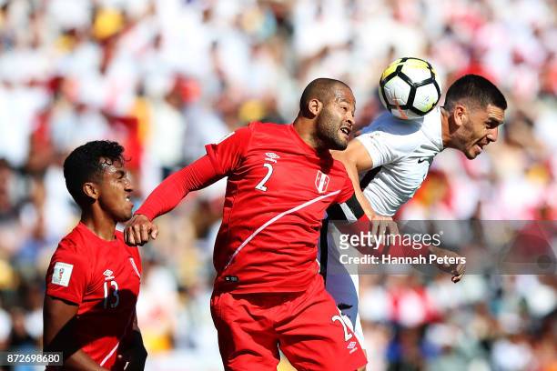 Alberto Rodriguez of Peru competes with Michael Boxall of the All Whites for the ball during the 2018 FIFA World Cup Qualifier match between the New...