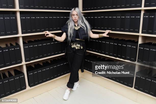 Singer Billie Eilish, wearing CHANEL, attends as CHANEL celebrates the launch of the Coco Club, a Boy-Friend Watch event at The Wing Soho on November...