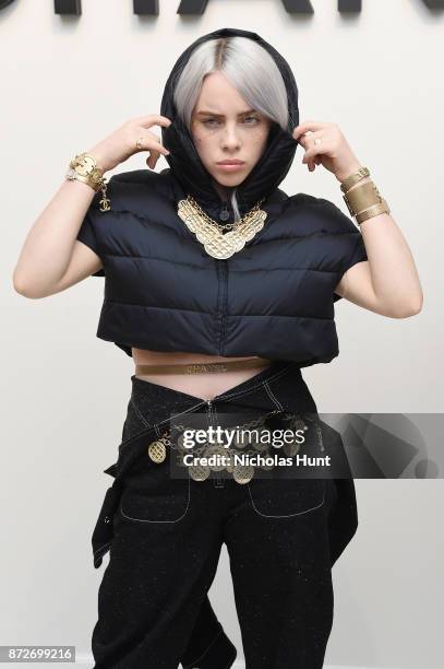 Singer Billie Eilish, wearing CHANEL, attends as CHANEL celebrates the launch of the Coco Club, a Boy-Friend Watch event at The Wing Soho on November...